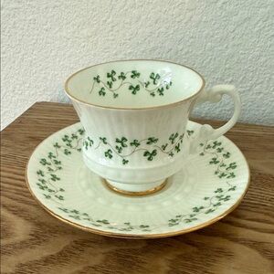Elegant Green and Gold Teacup and Saucer Set
